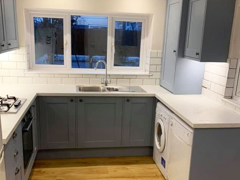 internal image of a newly decorated kitchen with new tiles, painting and floor by Hi-Lite Decorating and Property Maintenance